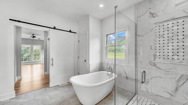 120 Lakelynn Ln, Shelbyville, KY 40065 - full bathroom featuring a soaking tub, a marble finish shower, recessed lighting, ceiling fan, and tile patterned flooring