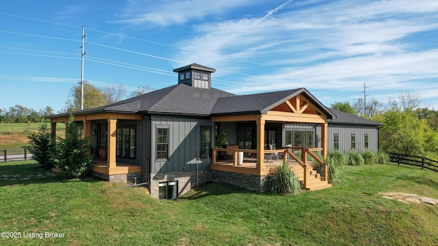 120 Lakelynn Ln, Shelbyville, KY 40065 - rear view of house with board and batten siding and a shingled roof