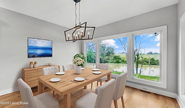 120 Lakelynn Ln, Shelbyville, KY 40065 - dining space featuring a chandelier and light wood-style floors