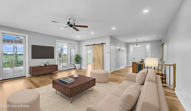 120 Lakelynn Ln, Shelbyville, KY 40065 - living room with a barn door, light wood-style floors, recessed lighting, and a ceiling fan