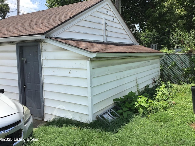 1852 Cypress St, Louisville, KY 40210 - exterior view of roof with shingles, a downspout, and gutters