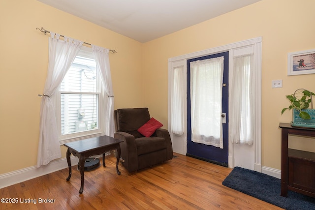 2309 Payne St, Louisville, KY 40206 - living area with wood finished floors and baseboards