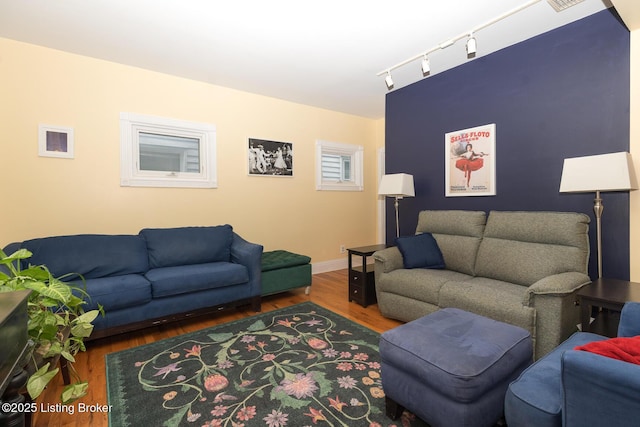 2309 Payne St, Louisville, KY 40206 - living area with track lighting and wood finished floors