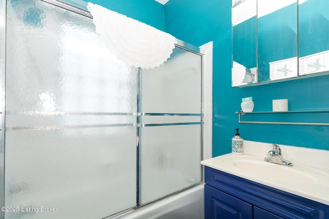2309 Payne St, Louisville, KY 40206 - bathroom with enclosed tub / shower combo and vanity