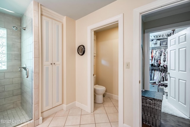 4025 Elmwood Ave, Louisville, KY 40207 - full bathroom with a shower stall, tile patterned floors, and a spacious closet