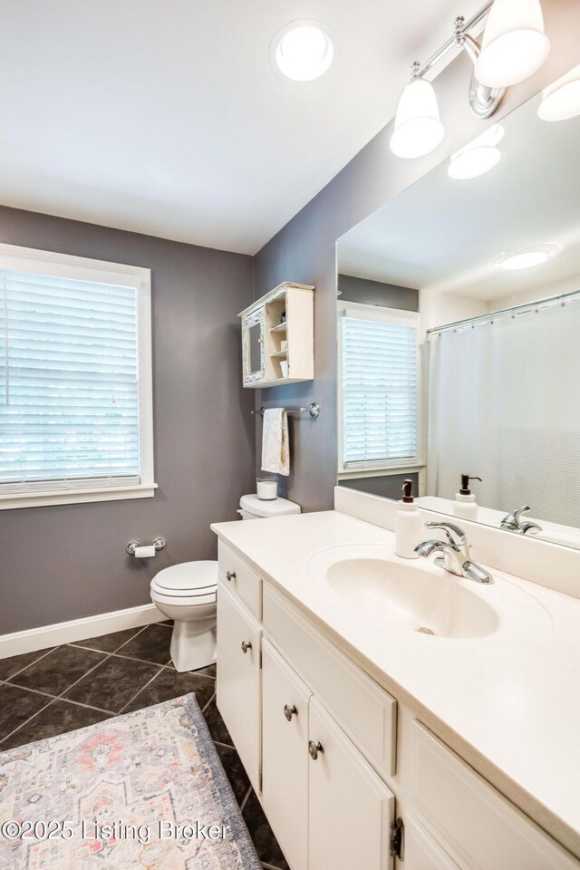 4025 Elmwood Ave, Louisville, KY 40207 - full bathroom with vanity, plenty of natural light, and tile patterned floors