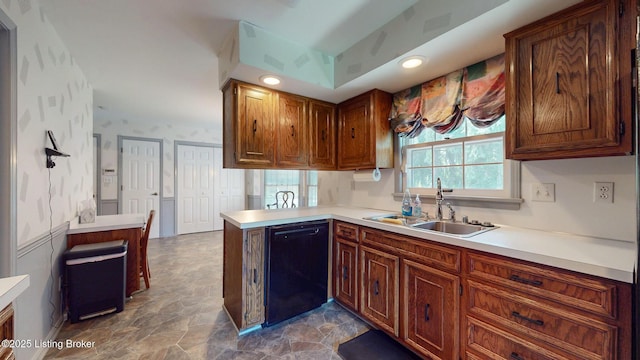 1810 Bainbridge Row Dr, Louisville, KY 40207 - kitchen featuring black dishwasher, a peninsula, light countertops, and stone finish floors