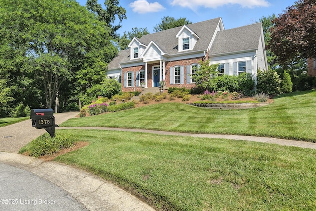 1375 Waxwing Pl, Louisville, KY 40223 - cape cod home with brick siding and a front lawn