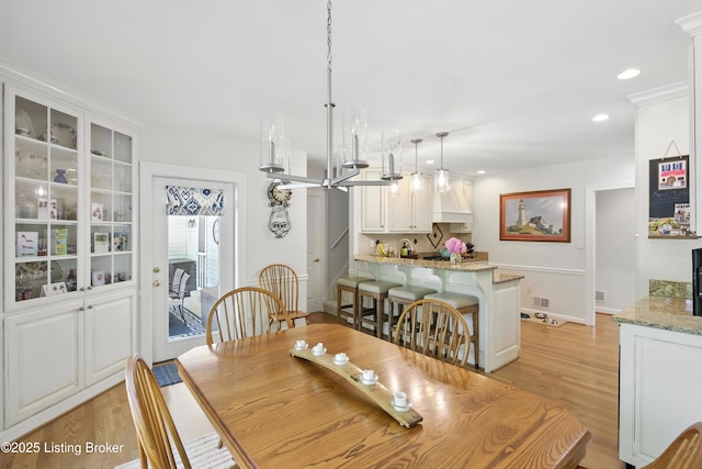 1375 Waxwing Pl, Louisville, KY 40223 - dining space with light wood-style floors and recessed lighting