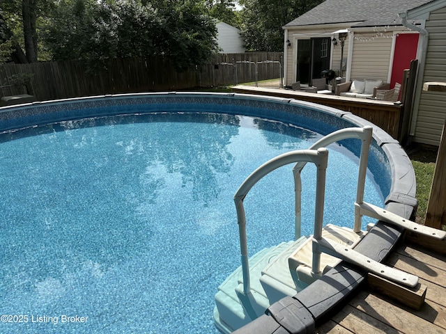11902 Queen Annes Ct, Louisville, KY 40245 - view of swimming pool with a wooden deck and outdoor lounge area