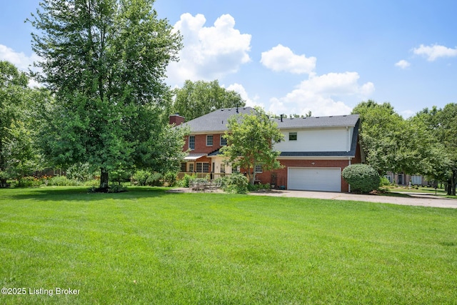 11731 Paramont Way, Prospect, KY 40059 - view of front facade featuring a garage, a front yard, brick siding, and driveway