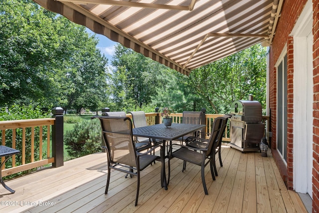 11731 Paramont Way, Prospect, KY 40059 - wooden terrace featuring outdoor dining area, grilling area, and view of wooded area