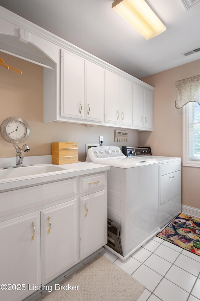 11731 Paramont Way, Prospect, KY 40059 - laundry room with cabinet space, washing machine and dryer, and light tile patterned floors