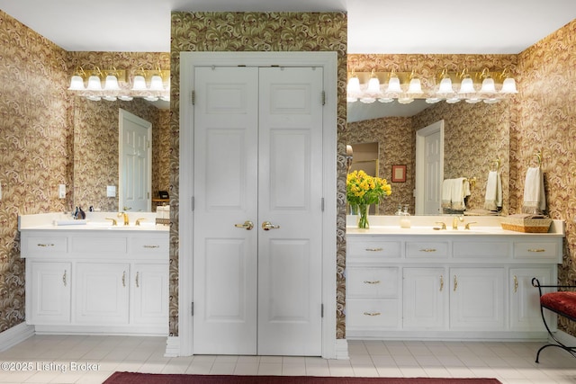 11731 Paramont Way, Prospect, KY 40059 - full bathroom with wallpapered walls, tile patterned floors, two vanities, and a closet