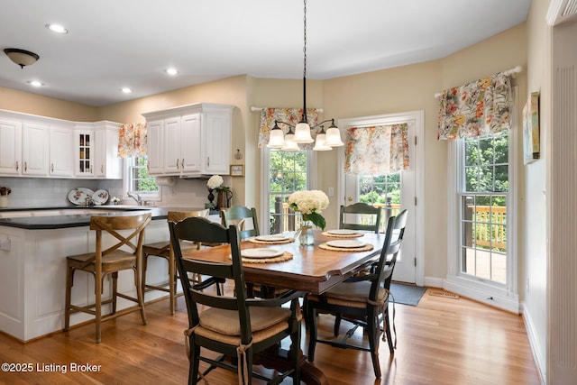 11731 Paramont Way, Prospect, KY 40059 - dining room featuring a chandelier, plenty of natural light, light wood finished floors, and recessed lighting