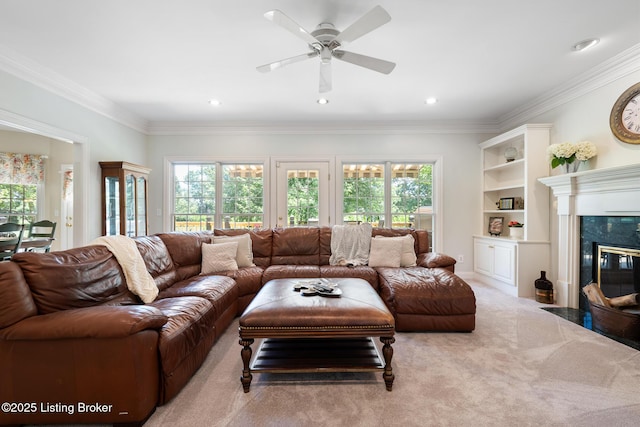 11731 Paramont Way, Prospect, KY 40059 - living area featuring healthy amount of natural light, carpet flooring, ceiling fan, crown molding, and recessed lighting