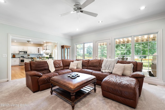 11731 Paramont Way, Prospect, KY 40059 - living room featuring light carpet, recessed lighting, ornamental molding, and ceiling fan