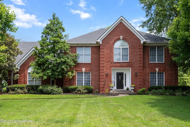 11731 Paramont Way, Prospect, KY 40059 - view of front of house with a front yard, brick siding, and a shingled roof