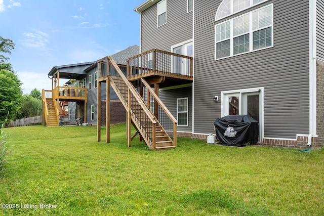18007 Ellerslie Dr, Louisville, KY 40245 - rear view of house with stairway, a deck, and a lawn