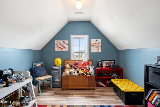 18007 Ellerslie Dr, Louisville, KY 40245 - recreation room with wood finished floors and vaulted ceiling