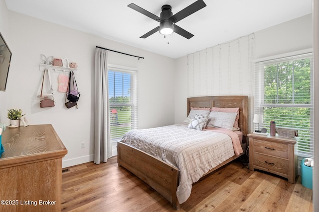 2070 Tonieville Rd, Hodgenville, KY 42748 - bedroom with light wood-type flooring and ceiling fan