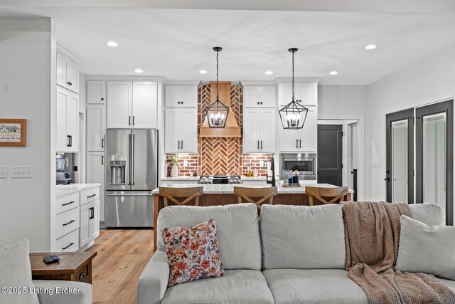 2070 Tonieville Rd, Hodgenville, KY 42748 - living room with light wood-style floors and recessed lighting