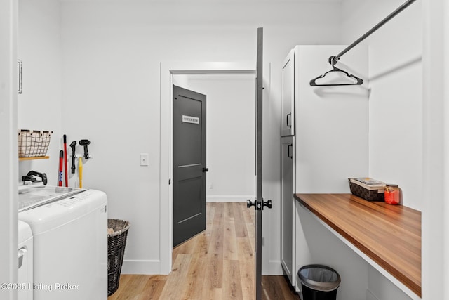2070 Tonieville Rd, Hodgenville, KY 42748 - laundry room featuring independent washer and dryer and light wood finished floors