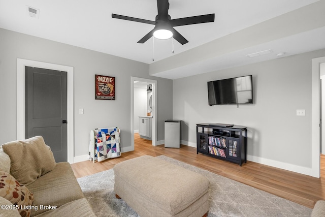 2070 Tonieville Rd, Hodgenville, KY 42748 - living area with ceiling fan and light wood finished floors