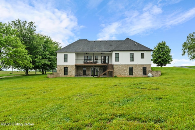 2070 Tonieville Rd, Hodgenville, KY 42748 - back of property with stairway, a lawn, a deck, a ceiling fan, and brick siding