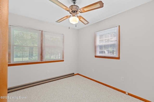85 Joseph Ave, Cecilia, KY 42724 - unfurnished room with a baseboard heating unit, carpet floors, and a ceiling fan