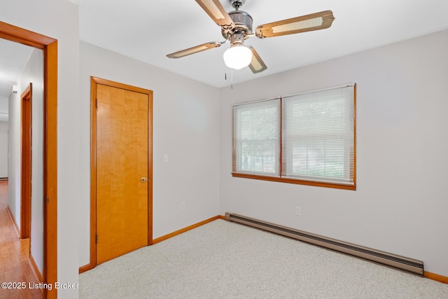 85 Joseph Ave, Cecilia, KY 42724 - unfurnished bedroom with a baseboard heating unit, light colored carpet, and ceiling fan