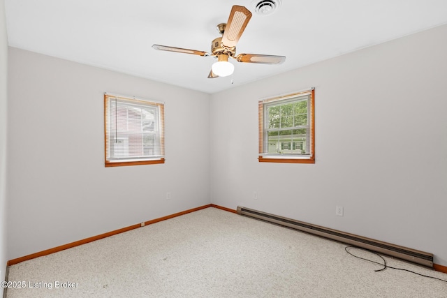 85 Joseph Ave, Cecilia, KY 42724 - spare room with baseboard heating, healthy amount of natural light, carpet, and a ceiling fan