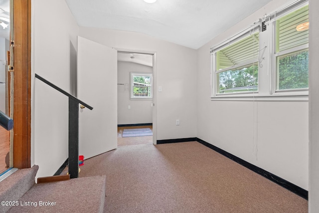 85 Joseph Ave, Cecilia, KY 42724 - carpeted spare room featuring lofted ceiling and baseboards