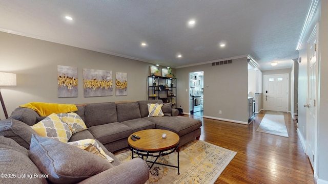 5613 Harrods Cv, Prospect, KY 40059 - living room with recessed lighting, wood finished floors, and ornamental molding