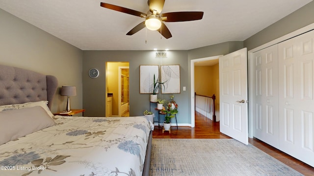 5613 Harrods Cv, Prospect, KY 40059 - bedroom with wood finished floors, a closet, ceiling fan, and connected bathroom