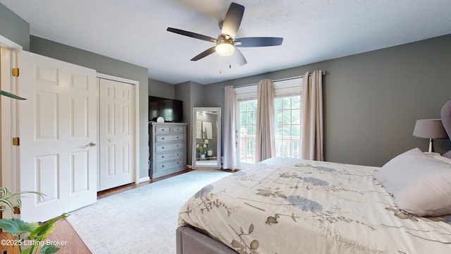 5613 Harrods Cv, Prospect, KY 40059 - bedroom with wood finished floors, a ceiling fan, and a closet