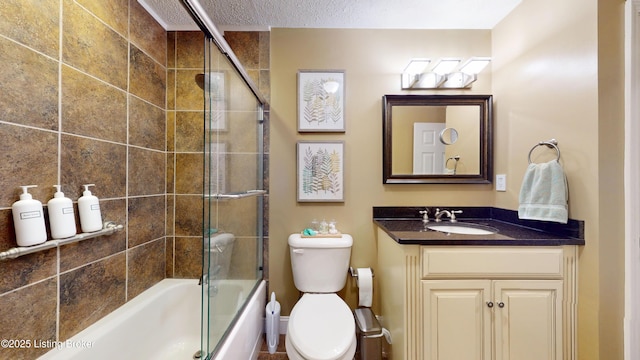 5613 Harrods Cv, Prospect, KY 40059 - full bath featuring vanity, combined bath / shower with glass door, and a textured ceiling