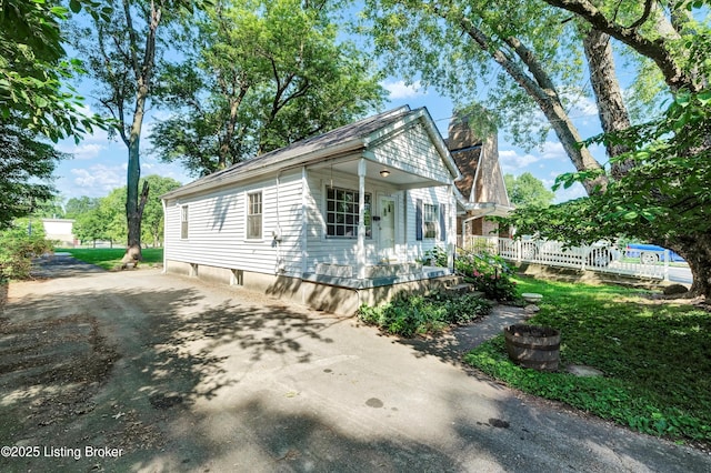 3010 Meade Ave, Louisville, KY 40217 - view of front of home with driveway and a porch