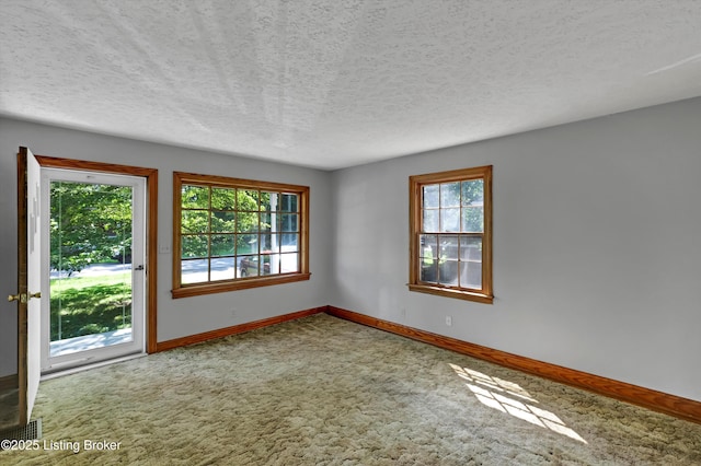 3010 Meade Ave, Louisville, KY 40217 - carpeted spare room featuring a textured ceiling