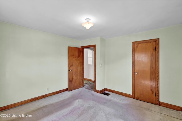 3010 Meade Ave, Louisville, KY 40217 - carpeted empty room featuring baseboards