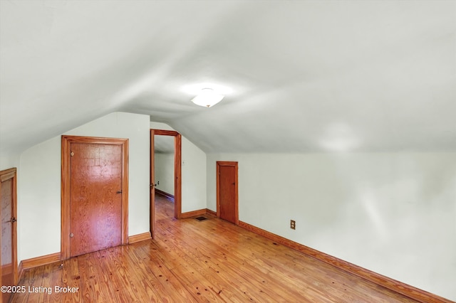 3010 Meade Ave, Louisville, KY 40217 - bonus room with light wood-style floors and vaulted ceiling