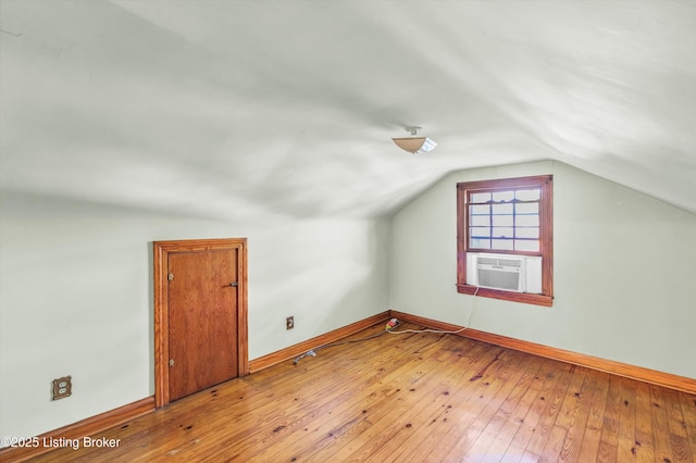 3010 Meade Ave, Louisville, KY 40217 - bonus room featuring vaulted ceiling, wood-type flooring, and cooling unit