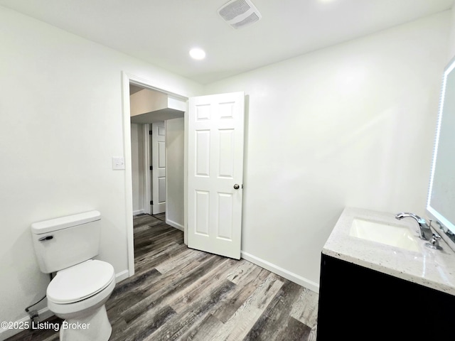 6910 Sylvania 4 Rd, Louisville, KY 40258 - bathroom with vanity, wood finished floors, and recessed lighting