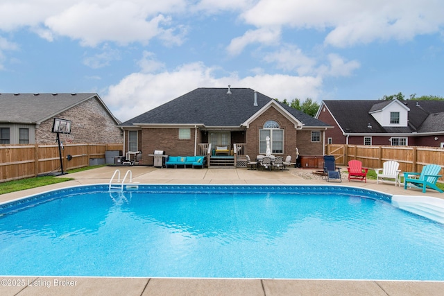 5613 Grandel Blvd, Louisville, KY 40258 - view of pool featuring a patio, a fenced backyard, and an outdoor living space