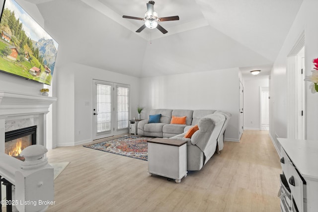 5613 Grandel Blvd, Louisville, KY 40258 - living room featuring light wood-type flooring, ceiling fan, a fireplace, and high vaulted ceiling