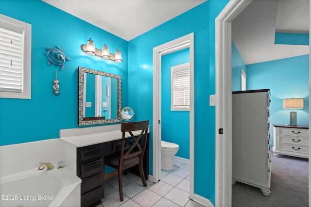 5613 Grandel Blvd, Louisville, KY 40258 - bathroom with a garden tub, vanity, and tile patterned floors