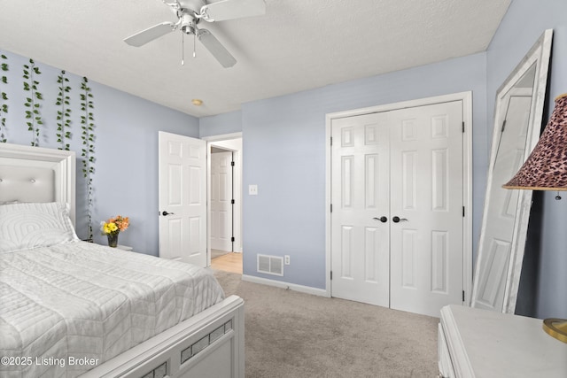 5613 Grandel Blvd, Louisville, KY 40258 - bedroom with light colored carpet, a ceiling fan, and a closet