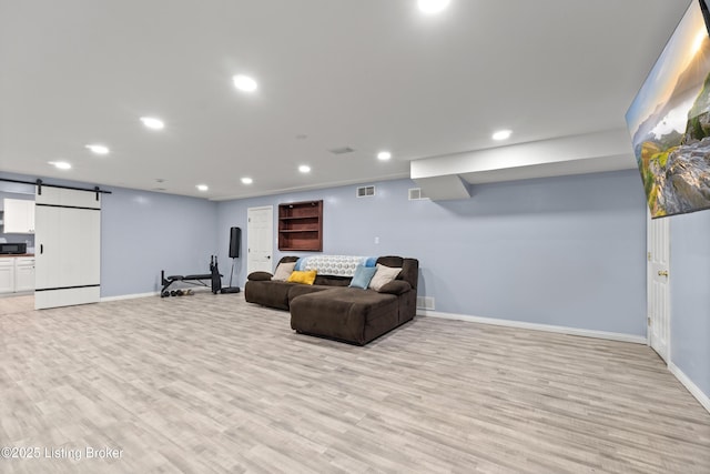 5613 Grandel Blvd, Louisville, KY 40258 - living area featuring recessed lighting, a barn door, and light wood-type flooring