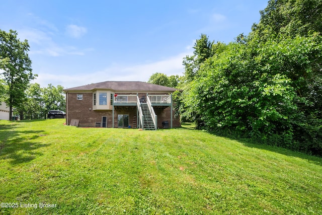 1126 Lagrange Rd, New Castle, KY 40050 - back of house featuring stairway, brick siding, a wooden deck, and a yard
