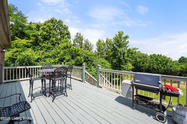 1126 Lagrange Rd, New Castle, KY 40050 - wooden deck with area for grilling, outdoor dining space, and view of scattered trees